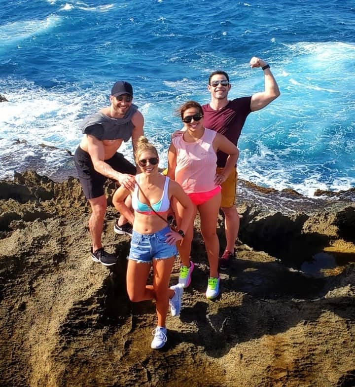 Friends celebrating on the coast